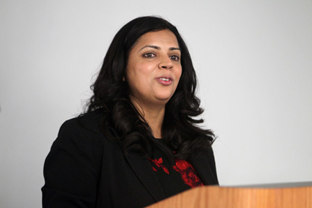 Lady giving speech at lectern