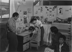 Family at the Manzanar Relocation Center.