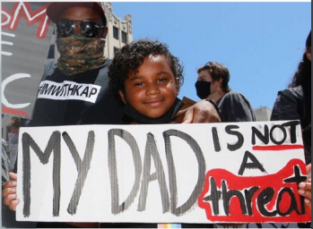 Family Protesting with My Dad is not a threat sign