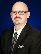 Kevin E. Grisham