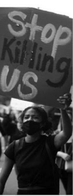 Protester with Stop killing us sign