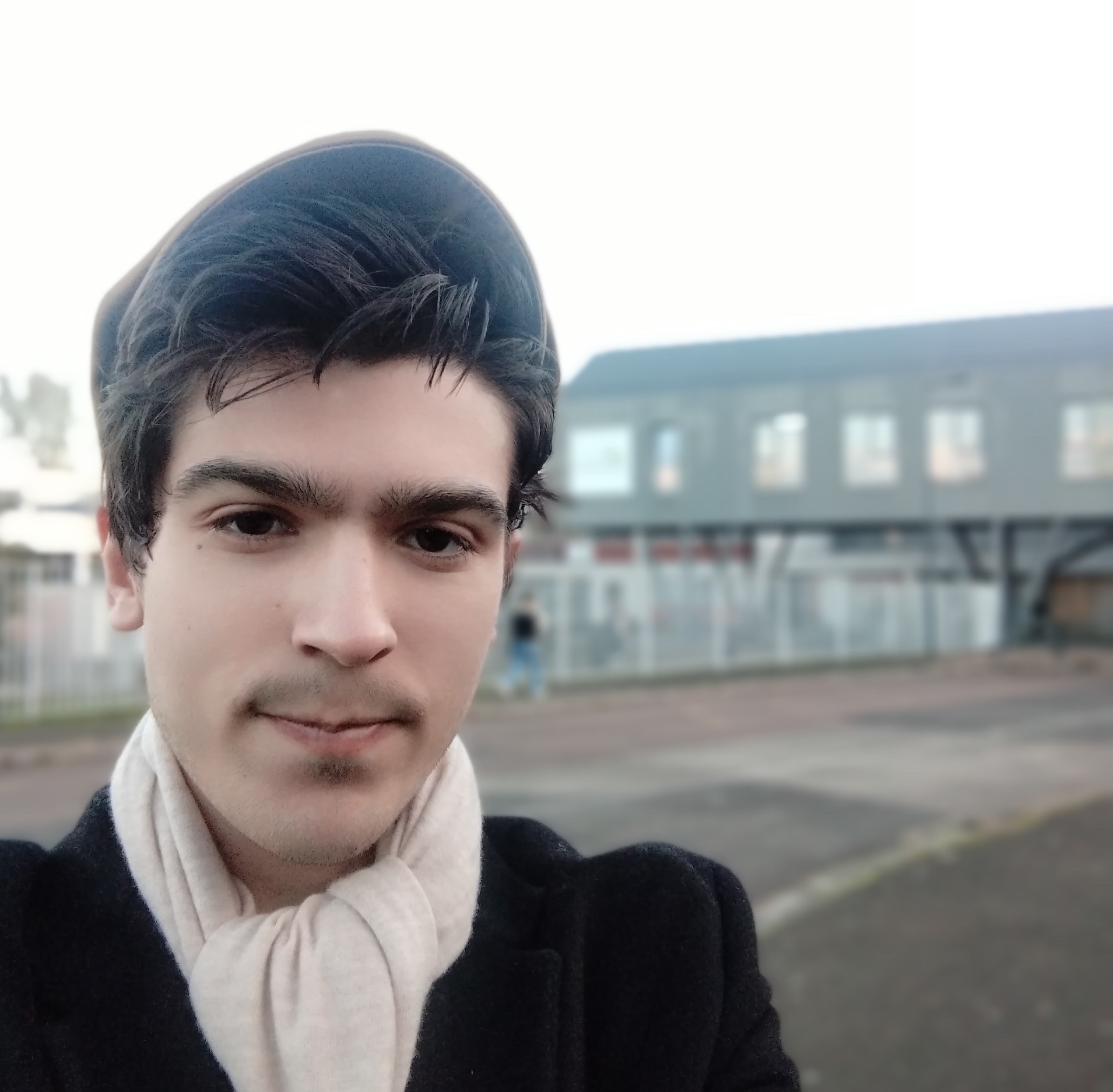 Thomas Donovan in front of his school in Gisors, France