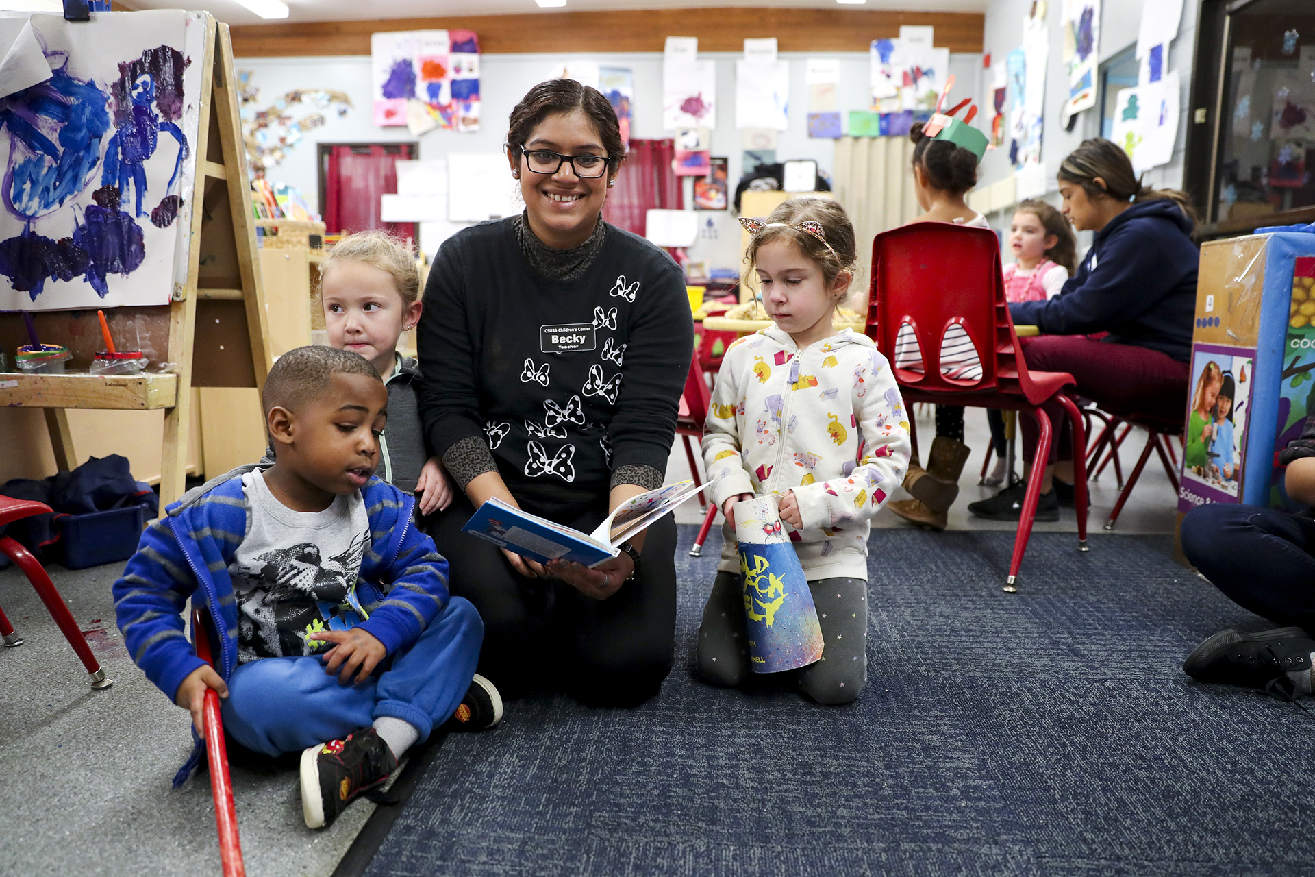 Teacher with children
