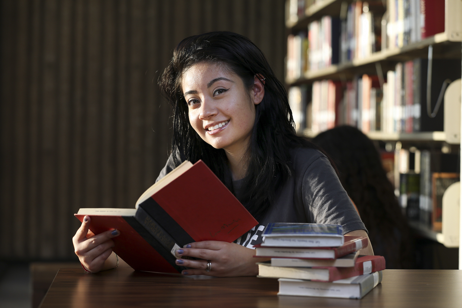 Woman reading in library