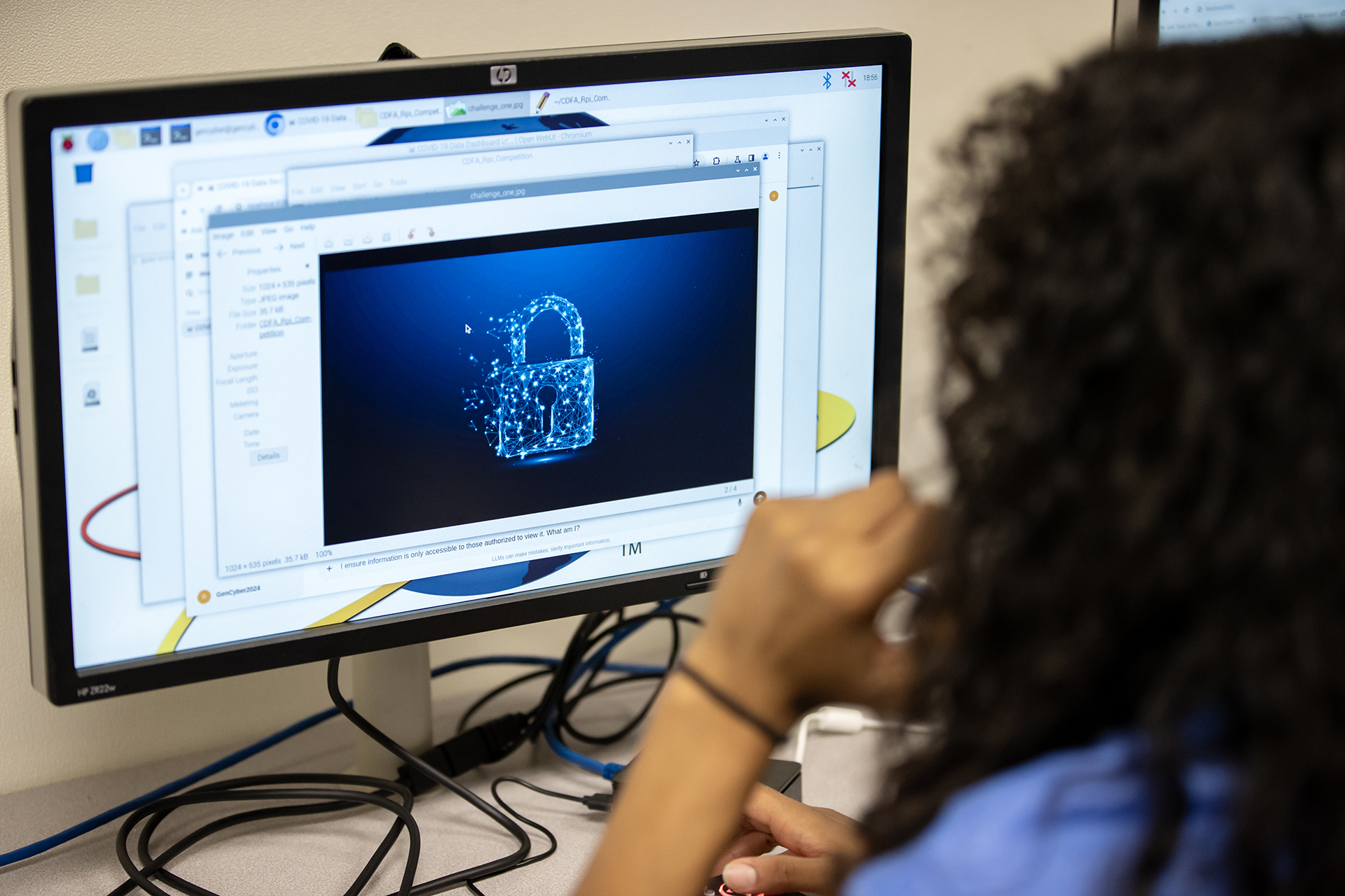 Cybersecurity woman at computer