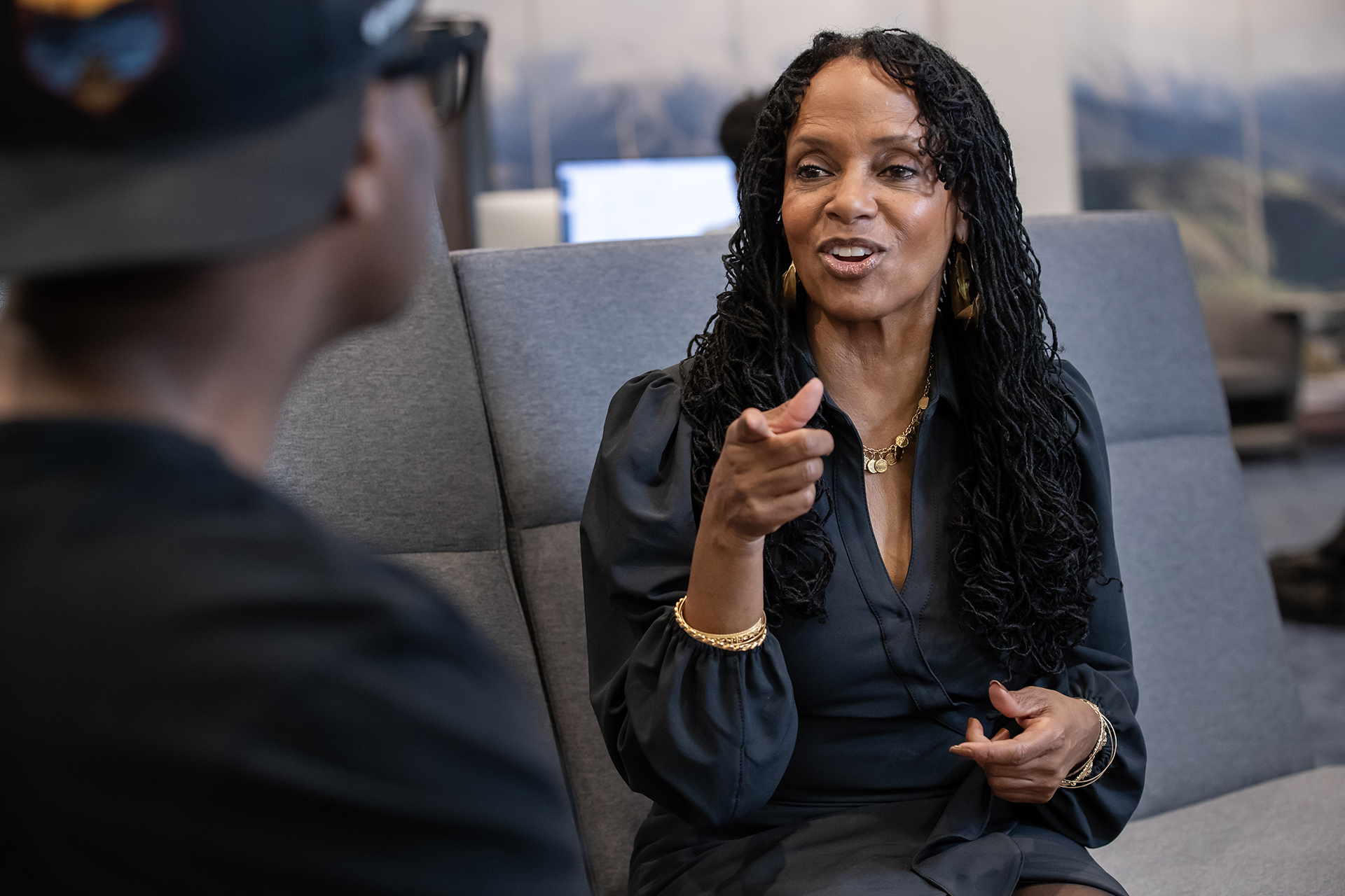 Woman interviewing student