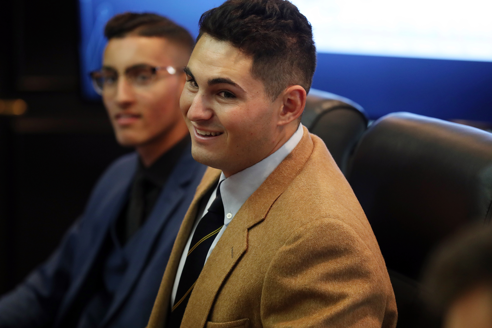 People sitting around conference table